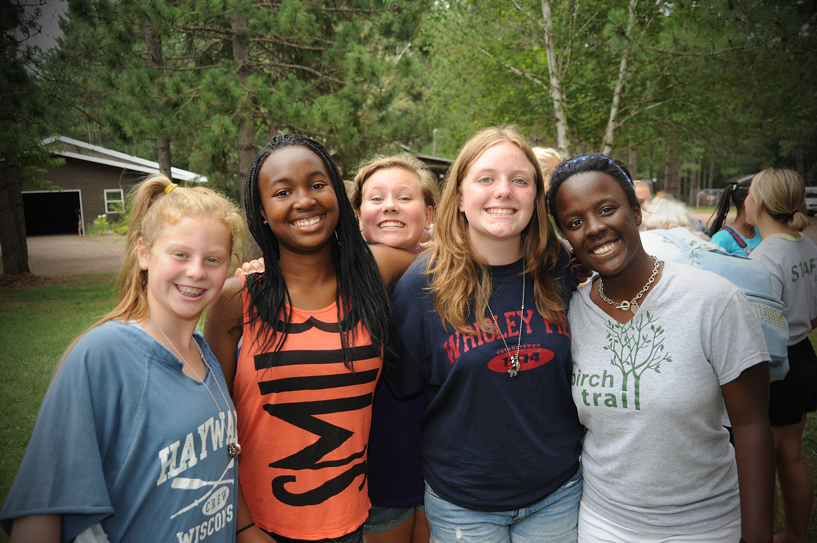 group of older girls smiling at camera