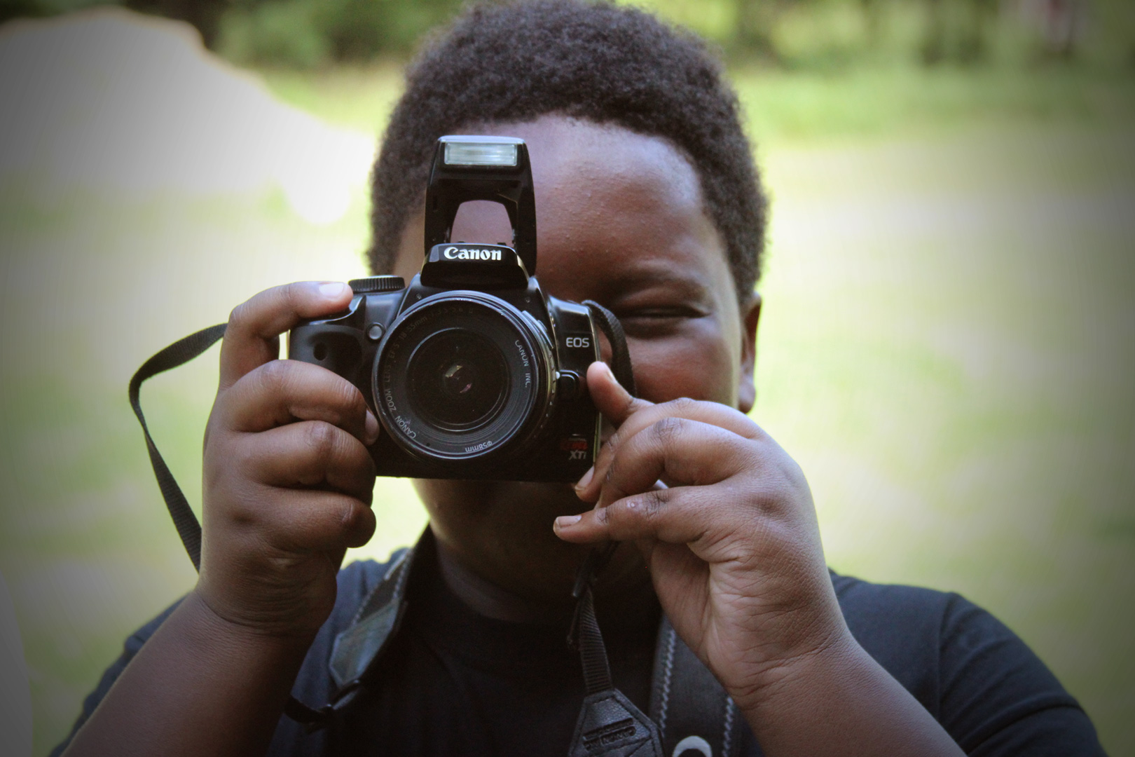 boy taking photo