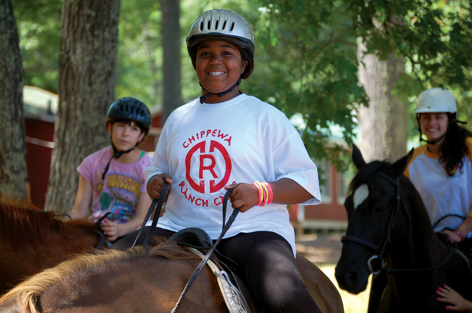 girls riding horseback at Camp Chippewa