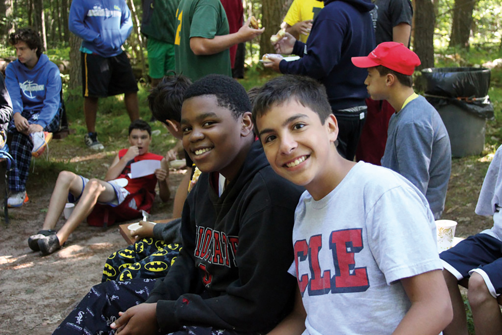 two boys smiling at camp