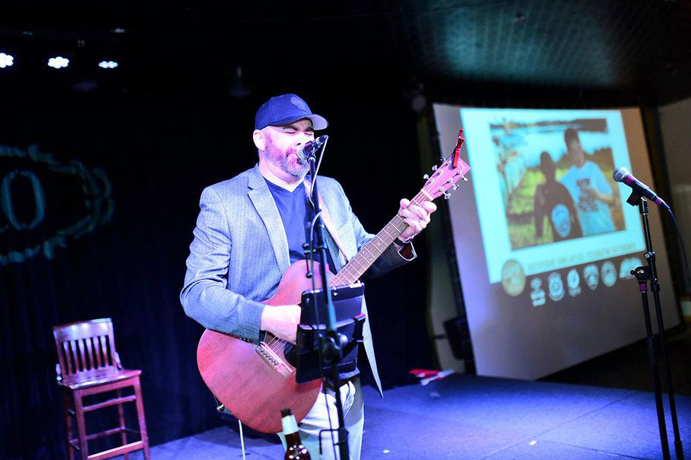 musician playing guitar