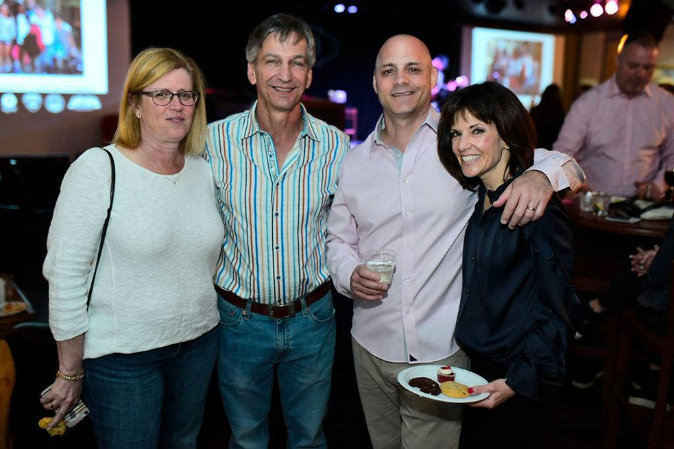 group of people smiling at camera