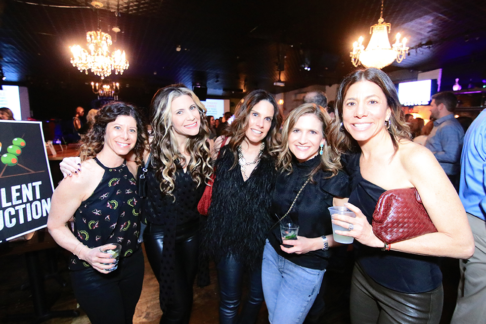 group of women smiling at camera