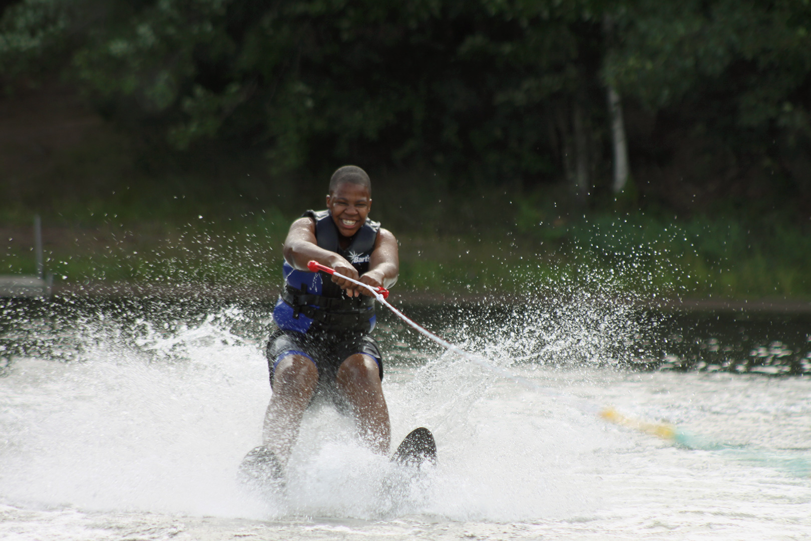 boy water skiing